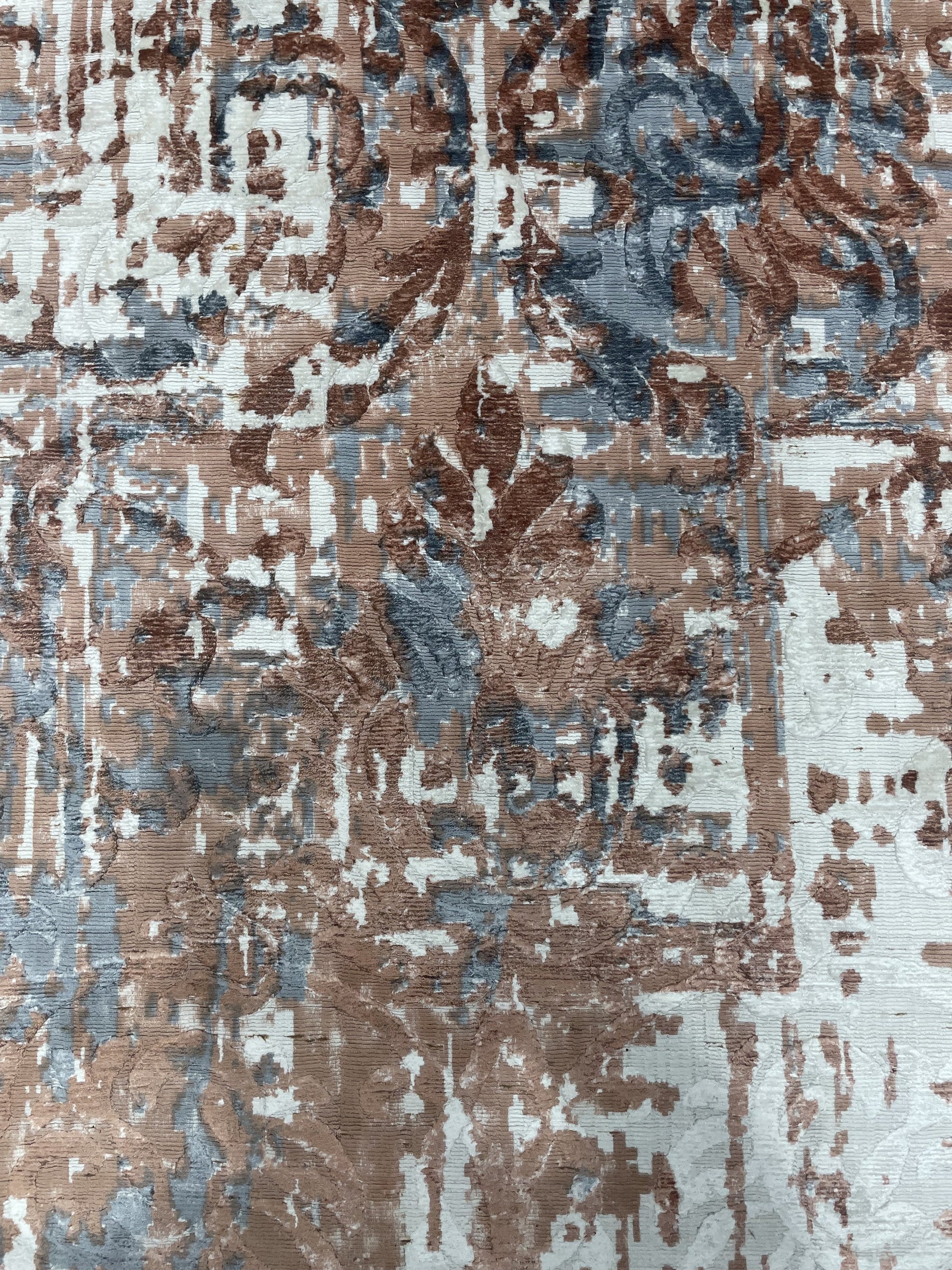 Charming Modern Coral Hand Knotted Wool Rug, showcasing warm coral hues and intricate hand-knotted details, rests in a bright living space, its soft wool texture inviting touch.