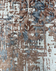 Charming Modern Coral Hand Knotted Wool Rug, showcasing warm coral hues and intricate hand-knotted details, rests in a bright living space, its soft wool texture inviting touch.
