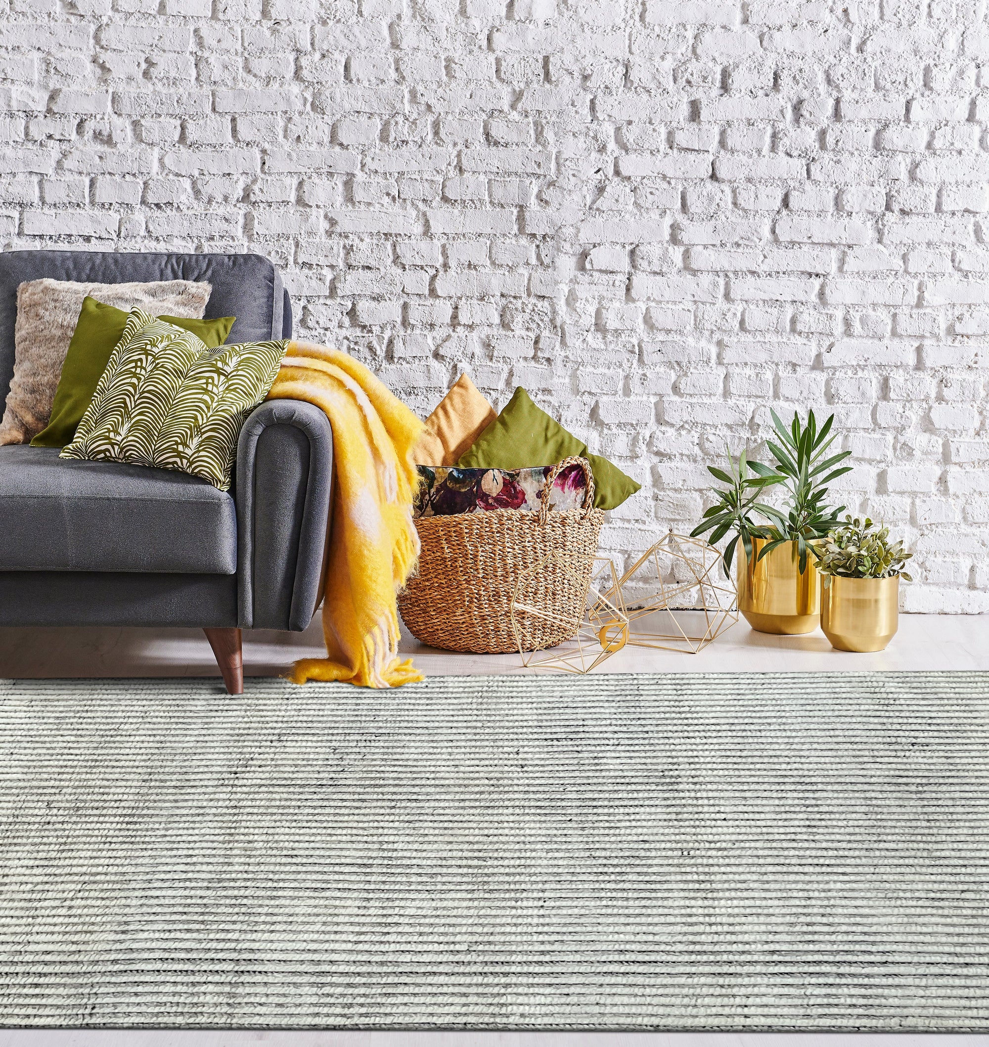 Graceful Vibrant Ivory Hand Knotted Wool Rug, displaying a subtle pattern in a well-lit interior setting, showcasing its texture and warm ivory tones.