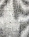 Graceful Vibrant Ivory Hand Knotted Wool Rug, textured ivory wool hand-knotted rug with subtle variations, enhancing a warm and inviting atmosphere.