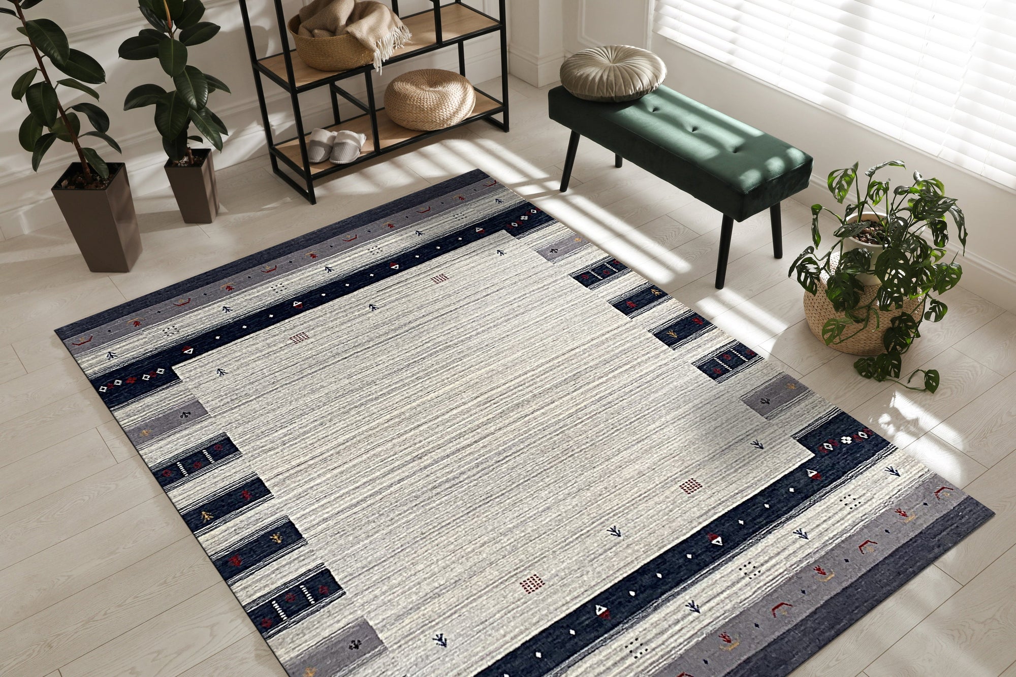 Radiant Gabbeh Multicolor Handmade Wool Rug displayed in a bright, modern living room setting, showcasing its vibrant palette and thick, textured wool construction under a coffee table with books and a plant.