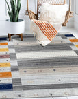 Classic Gabbeh Multicolor Hand Knotted Wool Rug, vibrant hues dance across hand-knotted wool, showcasing a traditional Gabbeh design in a modern living room setting.