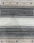 Classic Gabbeh Multicolor Hand Knotted Wool Rug, showcasing vibrant, hand-knotted wool with a traditional Gabbeh design featuring geometric patterns in reds, blues, yellows, and greens, spread across a light background.
