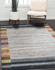 Chic Gabbeh Gray Handmade Wool Rug, soft gray tones and subtly textured wool creating a warm, inviting atmosphere on hardwood flooring.