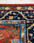 Elegant Traditional Rust Hand Knotted Wool Rug, a warm rust-toned wool rug with intricate traditional patterns, showcased in a brightly lit interior setting.