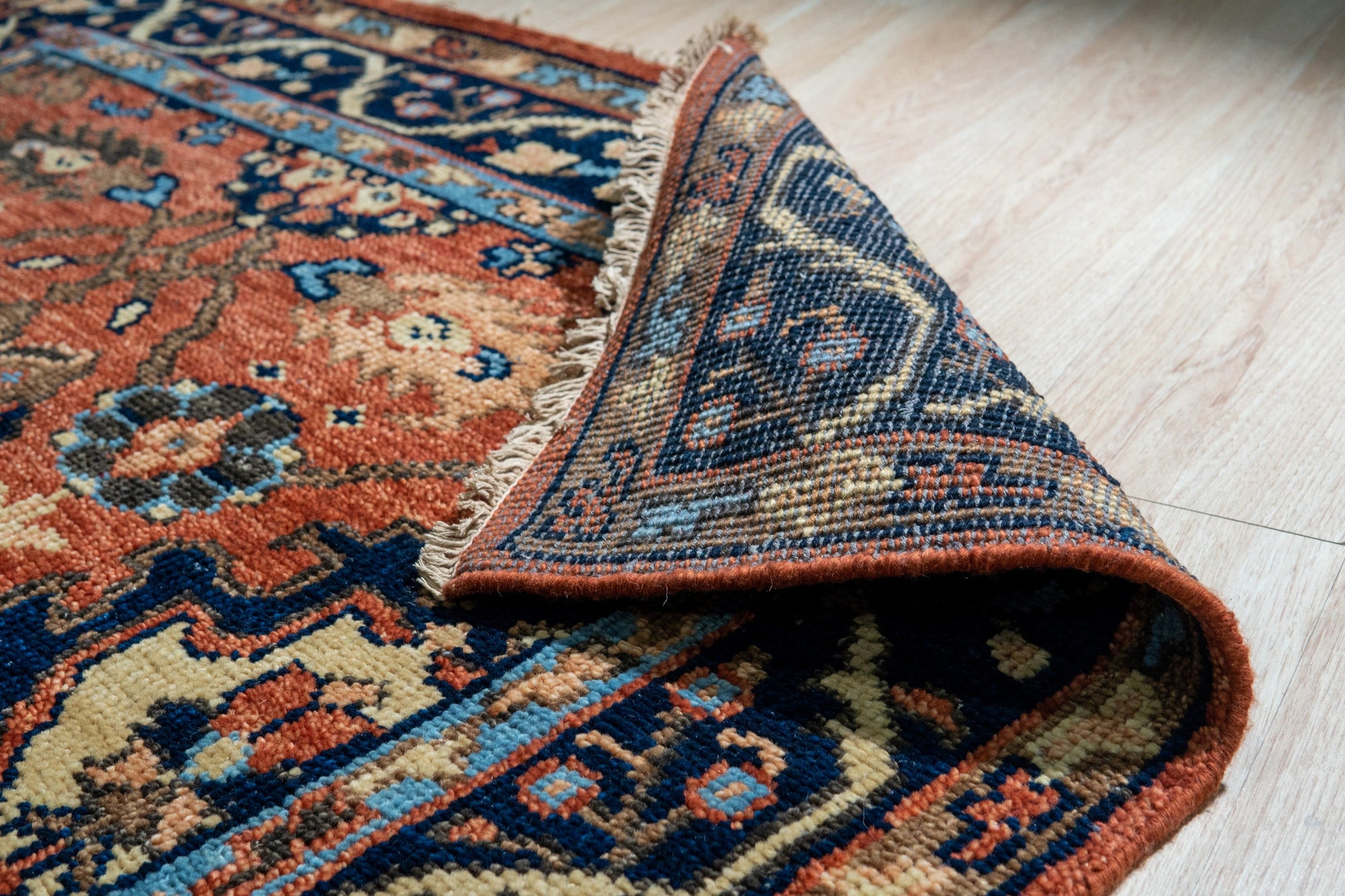 Elegant Traditional Rust Hand Knotted Wool Rug, showcasing rich rust hues and intricate traditional patterns in a detailed close-up.