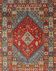 Isolated view of Mira Traditional Red Hand Knotted Wool Rug, showcasing its intricate, classic floral and geometric design.