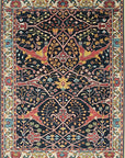 Isolated view showcasing the intricate design of the Enchanting Traditional Navy Hand Knotted Wool Rug.