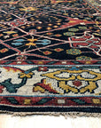 Enchanting Traditional Navy Hand Knotted Wool Rug, a navy wool rug with an intricate traditional pattern, displayed in a bright, modern living room setting.