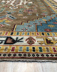 Classic Dazzling Brown Hand Knotted Wool Rug, a rich brown wool rug with intricate knotting, displayed in a bright, modern living room setting.