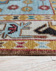 Classic Dazzling Brown Hand Knotted Wool Rug, its intricate hand-knotted construction and warm brown tones radiating sophistication on a light wooden floor.
