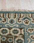 Charming Alluring Gray Hand Knotted Wool Rug, a gray wool rug with a subtle, textured pattern, displayed in a living room setting.