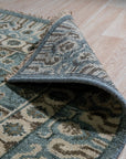 Charming Alluring Gray Hand Knotted Wool Rug, a hand-knotted gray wool rug with subtle textural variations, showcased on a light hardwood floor.