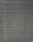 Isolated view of Sophie Alluring Gray Handmade Wool Rug, showcasing its subtly textured gray field and delicate, minimalist border design.