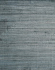 Isolated view of Para Elena Blue Handmade Wool Rug, showcasing its intricate geometric pattern in shades of blue, cream, and tan.
