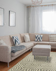 Beautiful Luna Gray Hand Tufted Wool Rug, featuring subtle variations in grey tones, displayed on a light hardwood floor, its dense wool fibers promising warmth and texture to any room.