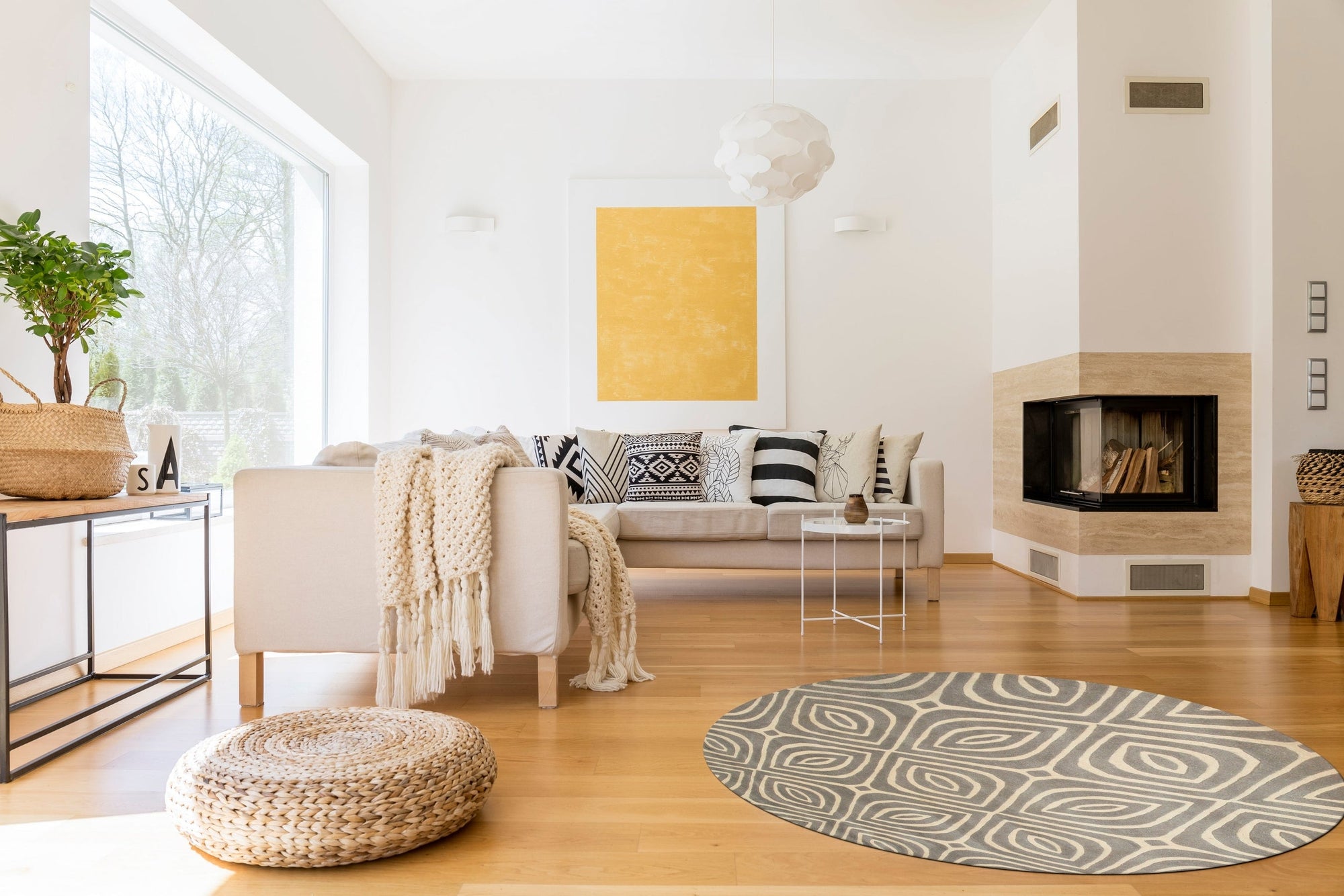 Beautiful Luna Gray Hand Tufted Wool Rug, soft gray tones and subtle texture create a comforting, modern vibe in a warmly lit living space.