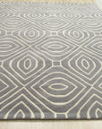 Beautiful Luna Gray Hand Tufted Wool Rug, its subtle grays and hand-tufted texture lending a sophisticated touch to a modern living room setting.