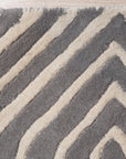 Beautiful Luna Gray Hand Tufted Wool Rug, soft gray hues and textured wool pile create a calming, neutral accent in a modern living space.