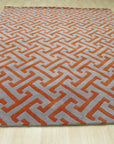 Comfortable Celia Gray Hand Tufted Wool Rug, showcasing a soft, textured gray surface suggesting comfort and warmth. Hand tufted construction is evident in the subtle variations of the wool pile, creating a visually appealing and inviting floor covering.