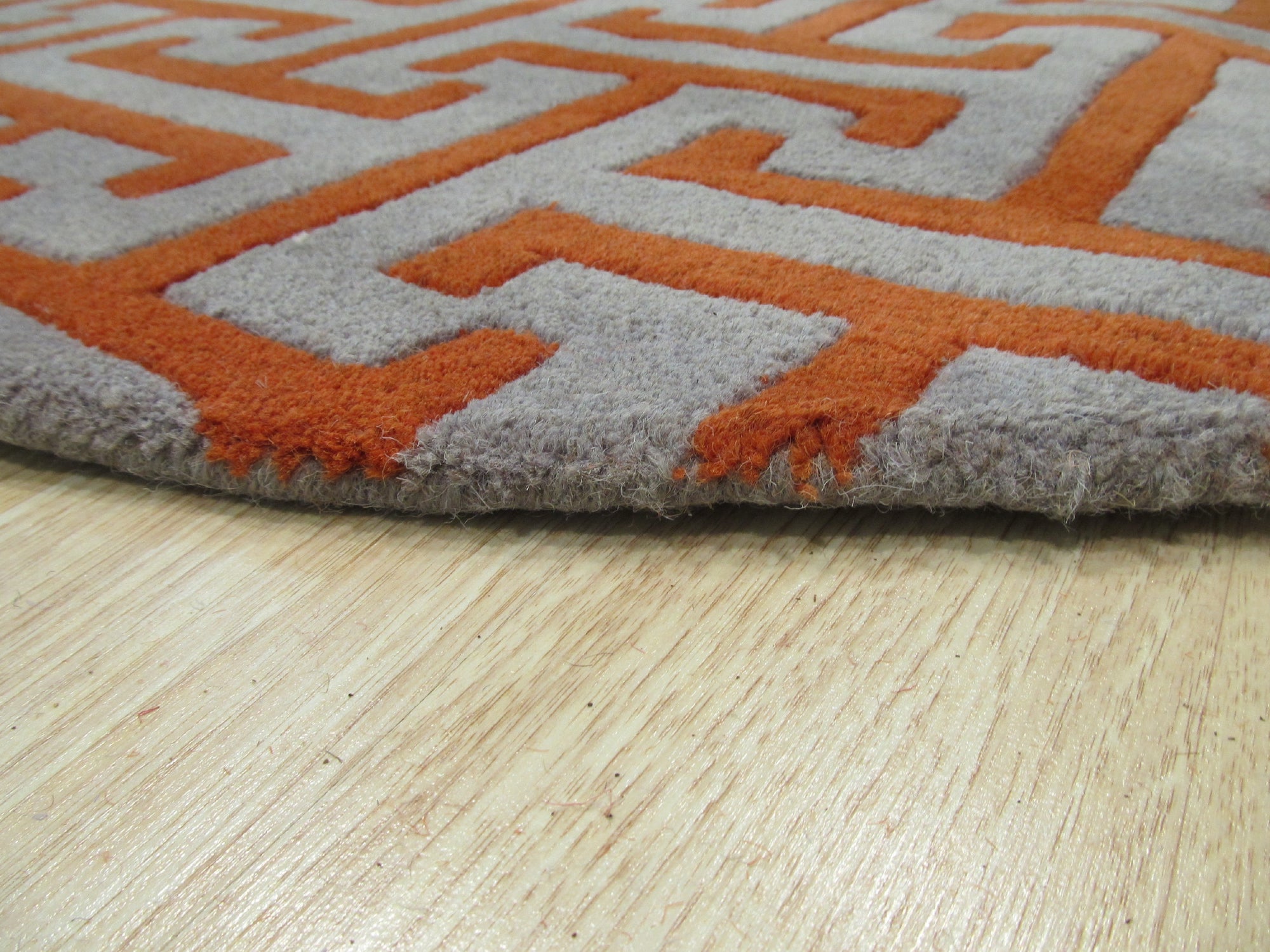 Comfortable Celia Gray Hand Tufted Wool Rug, soft gray tones and subtle texture create a calming atmosphere underfoot, showcasing the hand-tufted craftsmanship.