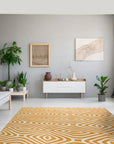 Sophisticated Jade Light Orange Hand Tufted Wool Rug, blending muted jade and light orange hues, softens a sunlit living room. The hand-tufted wool construction offers a plush texture underfoot, complementing the room's relaxed, modern aesthetic.