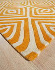 Sophisticated Jade Light Orange Hand Tufted Wool Rug, displaying a blend of jade and light orange hues, complements a modern interior with neutral walls and furniture, highlighting its soft wool construction and hand-tufted detail.