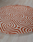 Luxurious Warm Orange Hand Tufted Wool Rug, its plush texture and vibrant orange hues lending warmth to a contemporary living space with modern furniture.