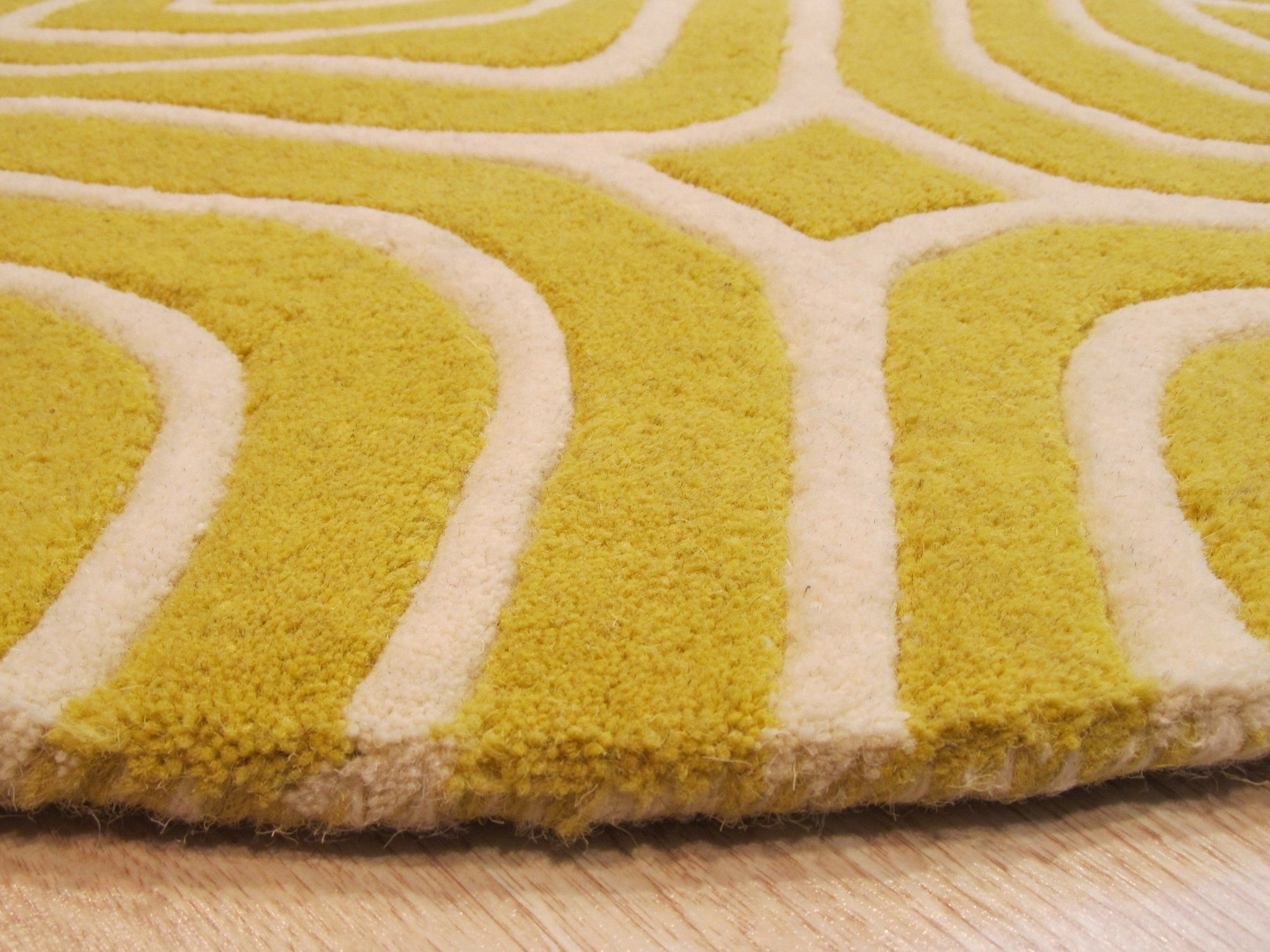 Ruby Para Yellow Hand Tufted Wool Rug, a vibrant geometric design in shades of yellow and ruby, adding a modern touch to a living space.