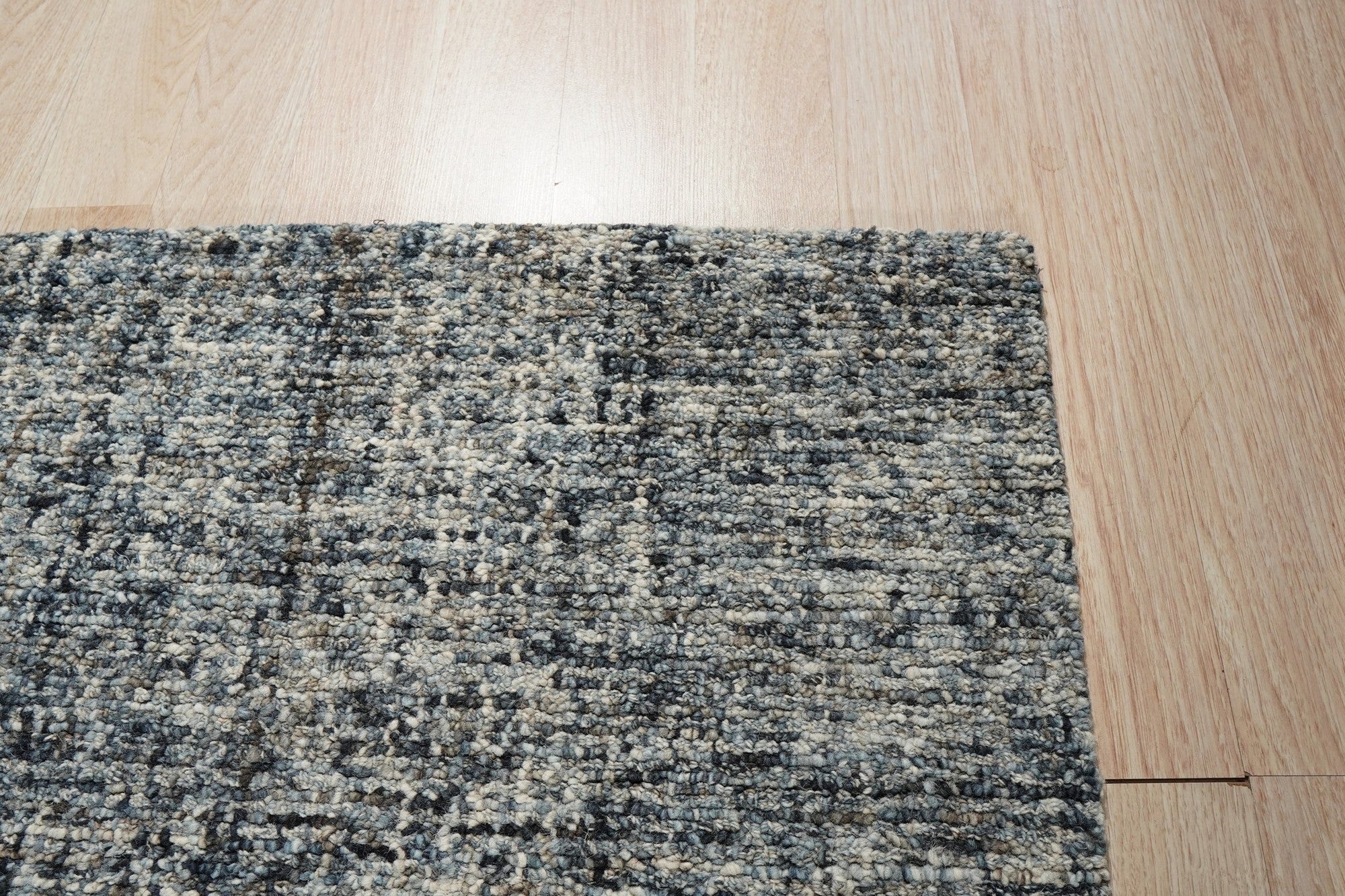 Elena Modern Dark Blue Hand Tufted Wool Rug, vibrant dark blue hues swirl across a plush hand-tufted surface, inviting comfort and adding modern elegance to any space.