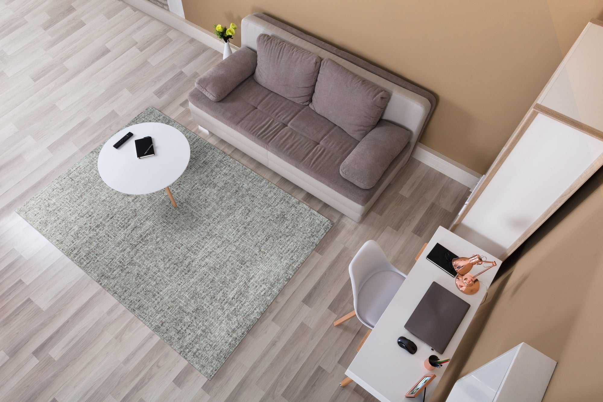 Kira Selene Dark Brown Hand Tufted Wool Rug, its rich dark brown tones and plush hand-tufted wool offering warmth and texture to a stylish living room setting.