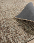 Kira Selene Dark Brown Hand Tufted Wool Rug, richly textured dark brown wool underfoot, anchoring a modern living space with understated elegance.