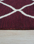 Timeless Louie Burgundy Hand Tufted Wool Rug, rich burgundy wool rug with a classic, intricate pattern, displayed in a room setting with complementing furniture.