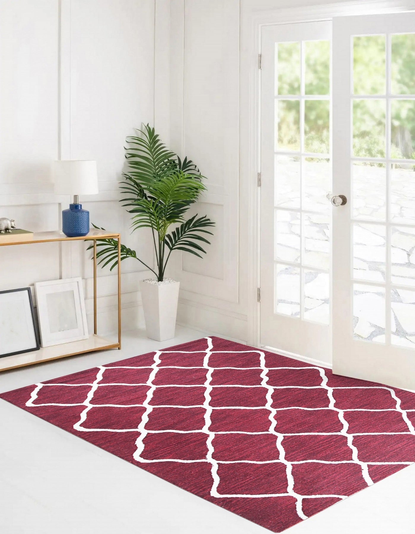 Timeless Louie Burgundy Hand Tufted Wool Rug, a richly patterned burgundy wool rug with intricate floral and geometric motifs, displayed in a softly lit living room setting.