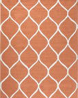 Maya Rustic Orange Hand Tufted Wool Rug: isolated view showcasing its textured, geometric design and warm, earthy color palette.