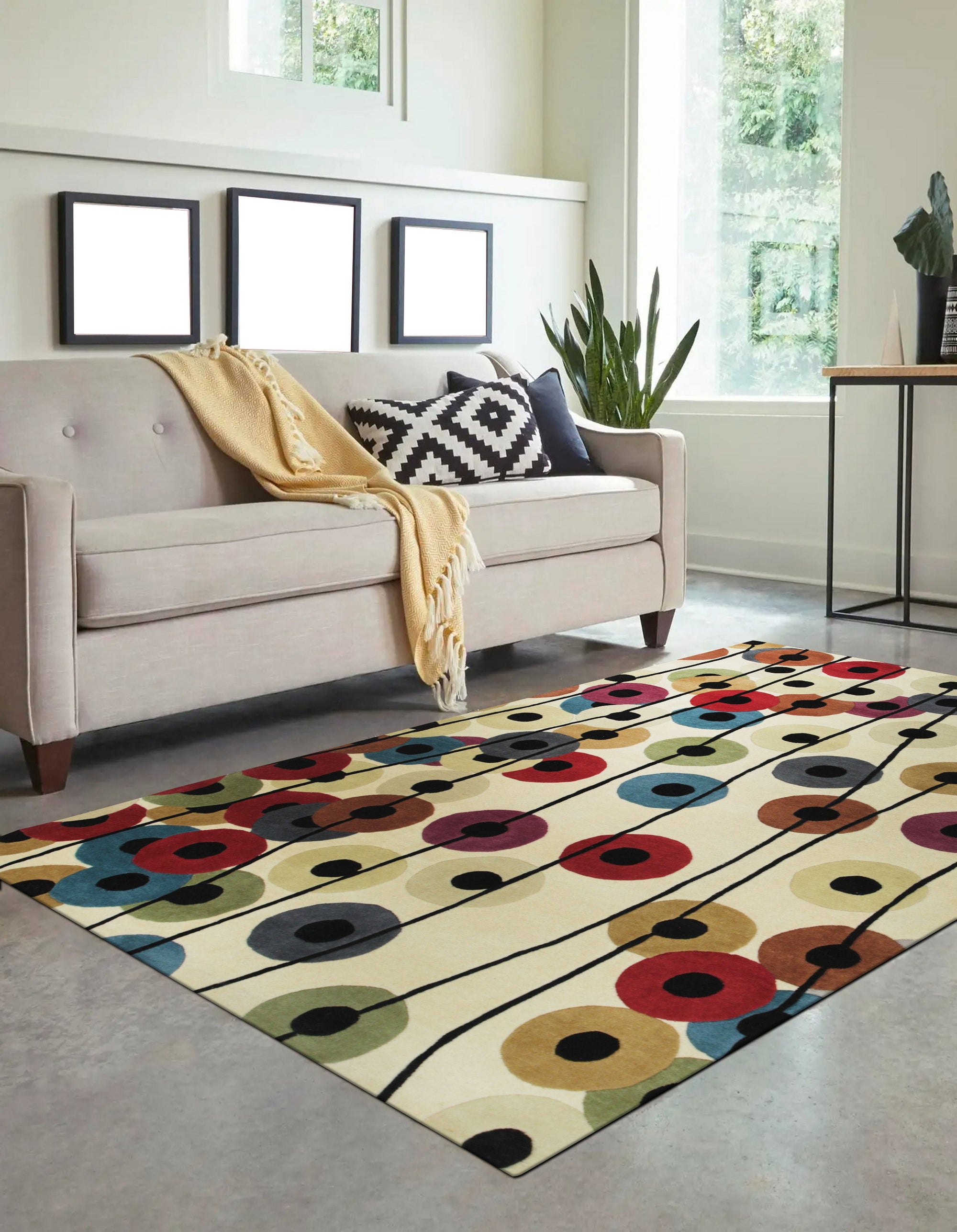 Modern Isla Multicolor Hand Tufted Wool Rug in a bright living room setting. Multicolored geometric patterns dance across the hand-tufted wool, adding a vibrant, modern touch to the space.