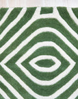 Radiant Amara Green Hand Tufted Wool Rug, its verdant hues and plush hand-tufted texture lending warmth and elegance to a modern living space with neutral furniture.