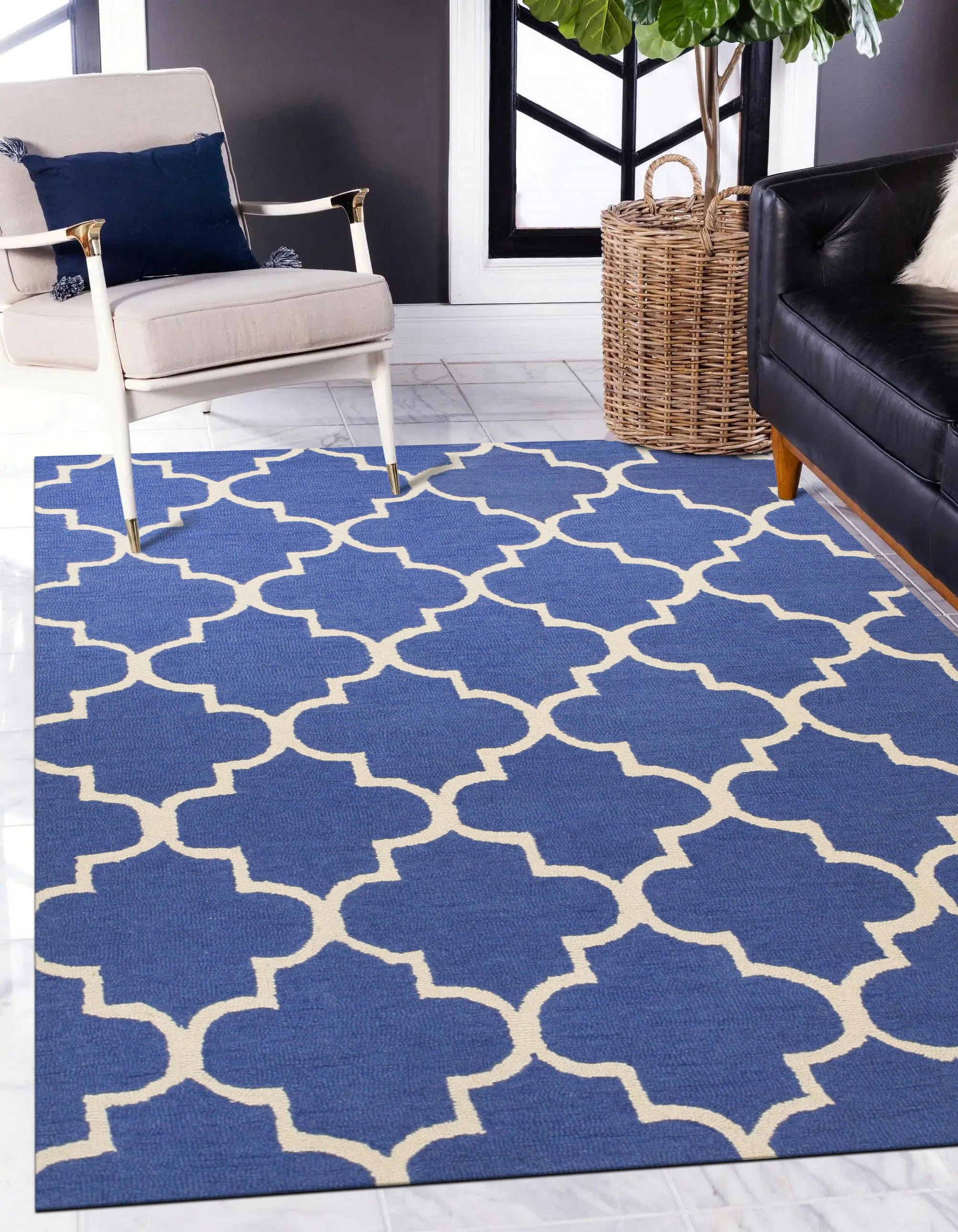Dazzling Trellis Dark Blue Hand Tufted Wool Rug in a living room setting, showcasing its deep blue hue and geometric trellis pattern against light hardwood flooring.