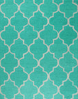 Isolated view of Giselle Moroccan Teal Green Hand Tufted Wool Rug, showcasing its intricate geometric pattern.