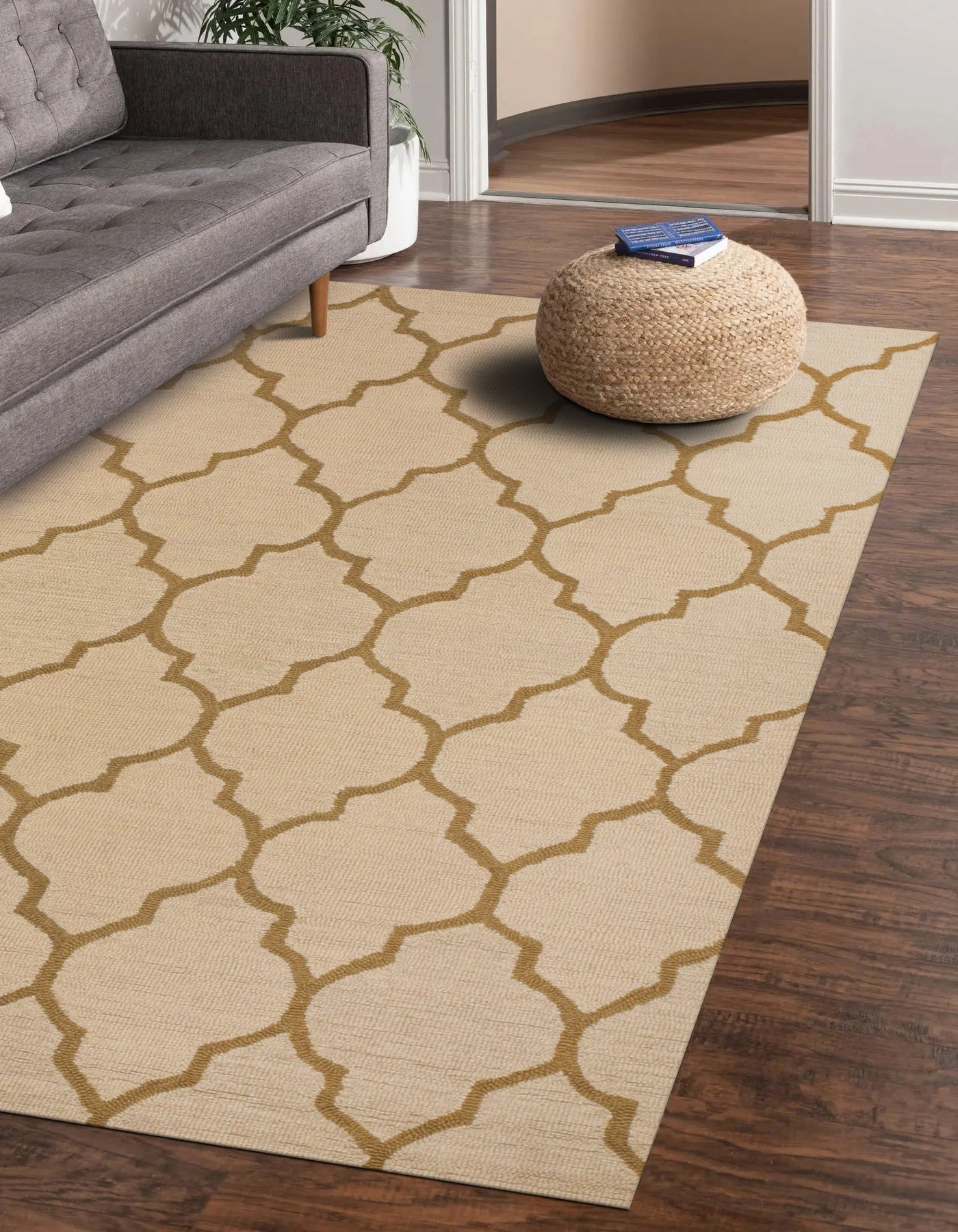 Ruby Trellis Light Beige Hand Tufted Wool Rug, light beige tones displaying a trellis pattern, hand-tufted wool texture softly illuminated in a room setting.