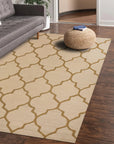 Ruby Trellis Light Beige Hand Tufted Wool Rug, light beige tones displaying a trellis pattern, hand-tufted wool texture softly illuminated in a room setting.