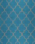 Isolated view of Sloane Moroccan Royal Blue Hand Tufted Wool Rug, showcasing its intricate geometric diamond lattice design in deep royal blue and cream wool.