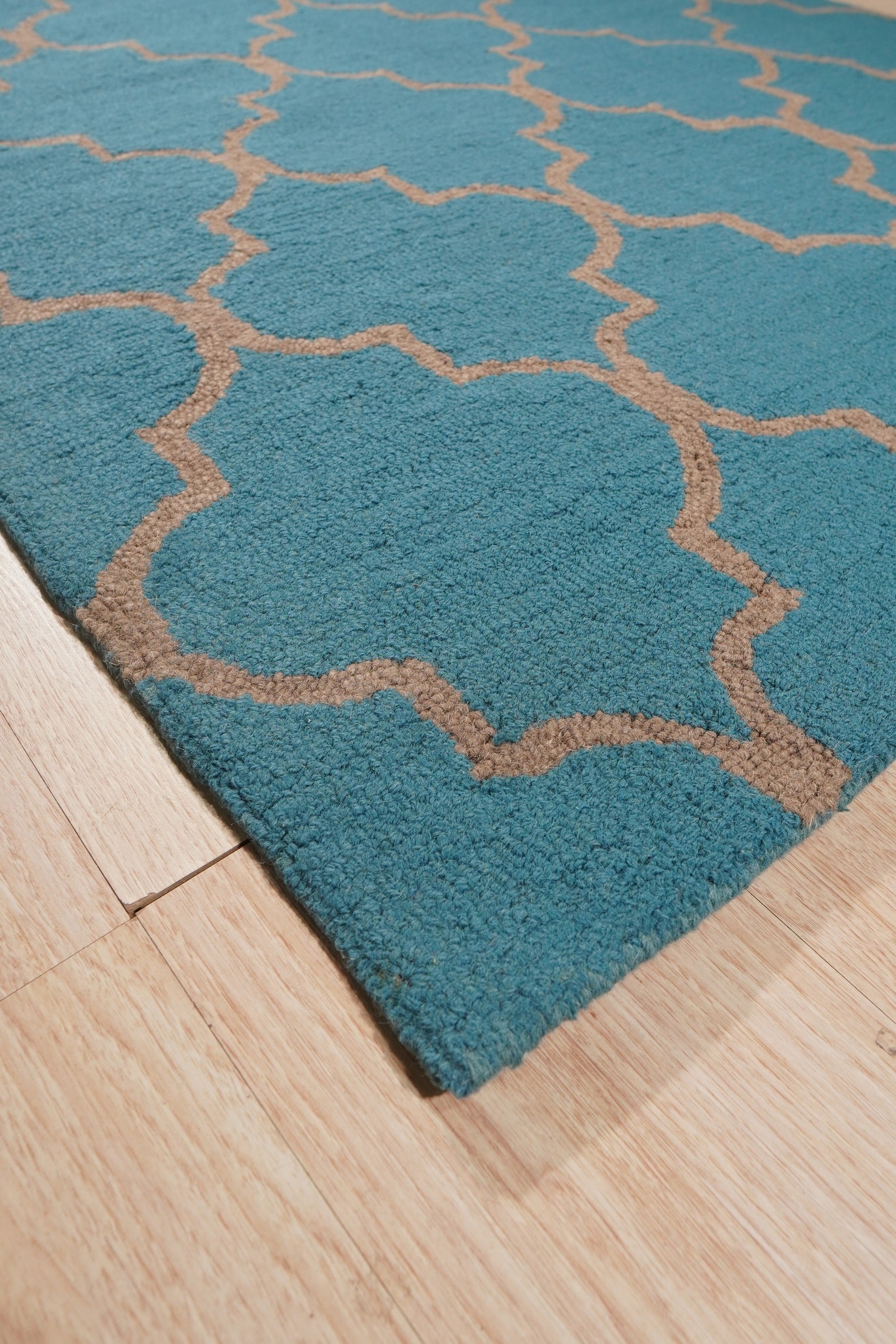 Sloane Moroccan Royal Blue Hand Tufted Wool Rug, royal blue wool rug with a geometric Moroccan-inspired design, adding warmth and texture to a modern living space.