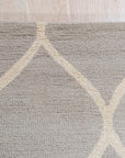 Classic Cozy Light Brown Hand Tufted Wool Rug, light brown texture fills the frame, showcasing the hand-tufted wool construction and subtle variations in shade.