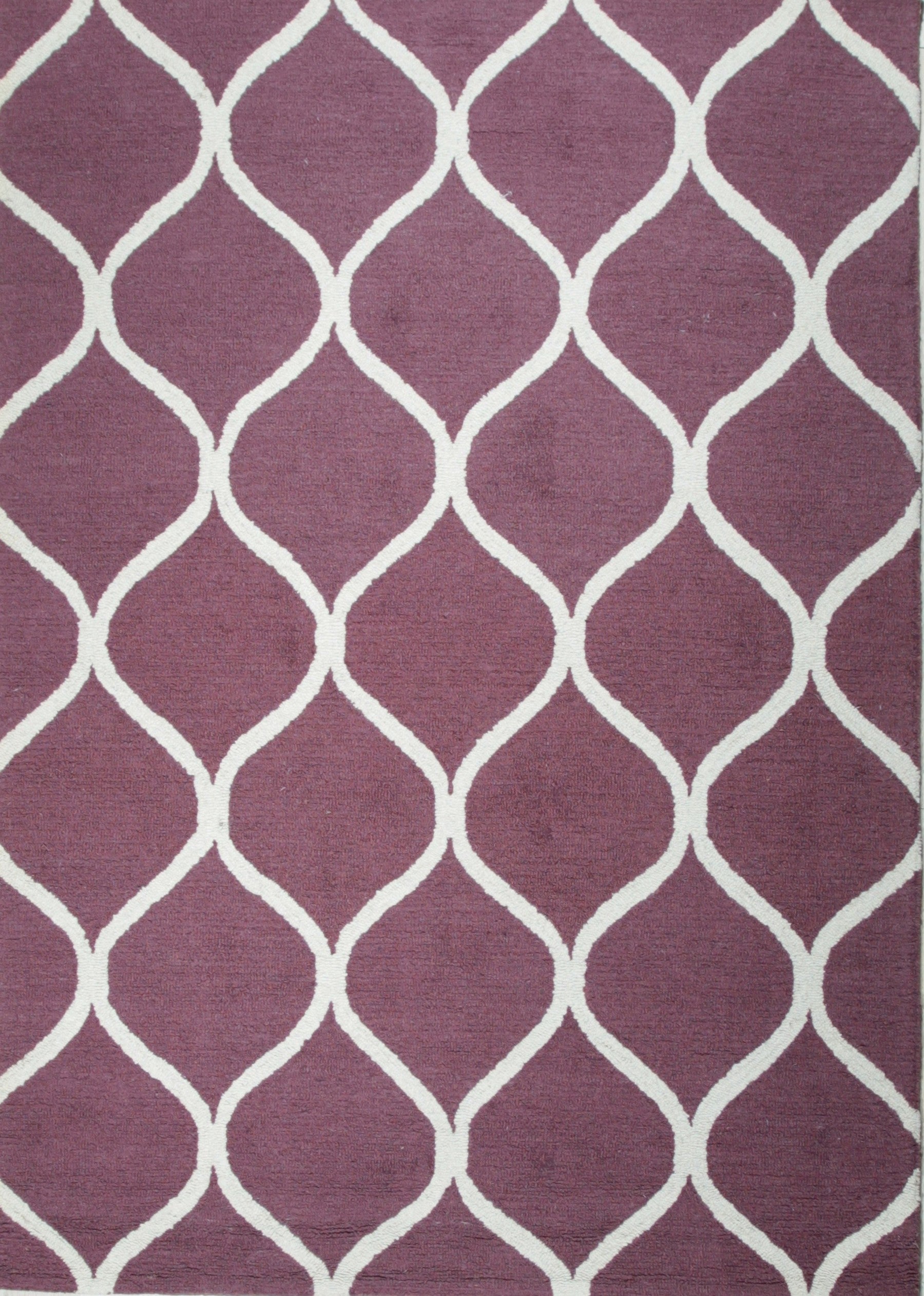 **Isolated view of Ava Exquisite Burgundy Hand Tufted Wool Rug, showcasing its intricate floral pattern.**
