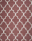 Giselle Iris Brown Hand Tufted Wool Rug styled in a modern living room - area rug lifestyle photo