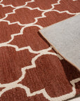 Giselle Iris Brown Hand Tufted Wool Rug displayed in a room setting. Soft browns and subtle iris hues create a warm, inviting atmosphere in this hand-tufted wool rug.