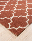 Giselle Iris Brown Hand Tufted Wool Rug, a blend of warm browns and subtle iris hues in a textural, hand-tufted design, displayed within a styled interior setting.