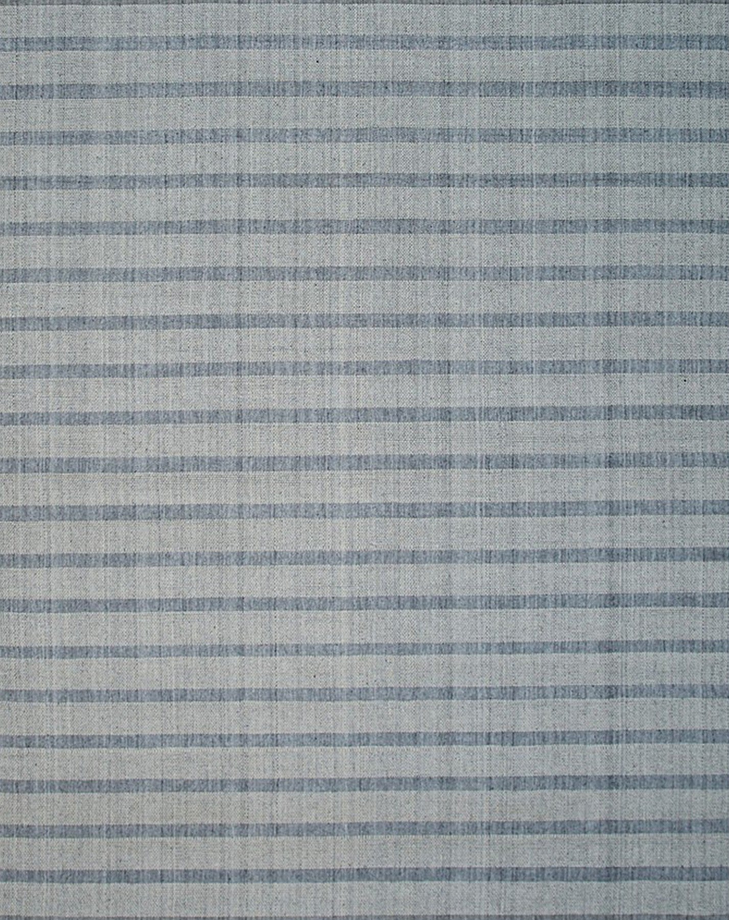 Luxurious Timeless Gray Handmade Wool Rug, showcasing its intricate geometric design in shades of soft gray, with a subtle, raised texture visible in the close-up view.