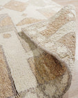 Inviting Oushak Ivory Hand Knotted Wool Rug, an ivory wool rug with a traditional Oushak design, displayed on a light-colored hardwood floor.
